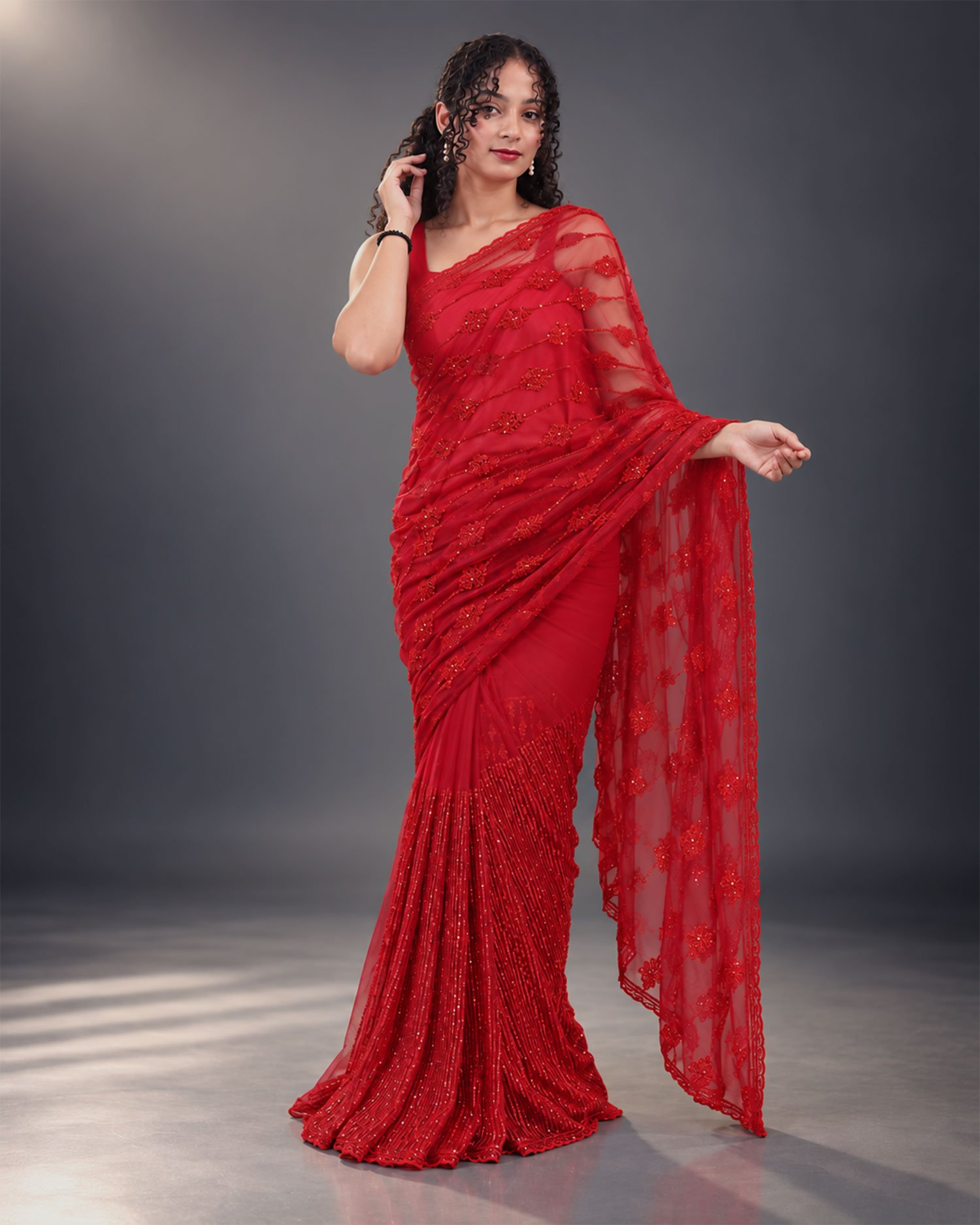 Red Homecoming Party Wear Saree Red embroidered party wear saree with sequin work and net pallu
